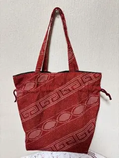 ハンドメイド　巾着袋(取手付き) 朱色プリント模様　軽量