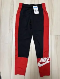 新品　未使用　NIKE 子供用 裏起毛　長ズボン 150 (M) 黒/赤