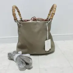 【未使用】BEAURE 本革 バンブーハンドル 巾着バッグ 2WAY 近年のサムネイル