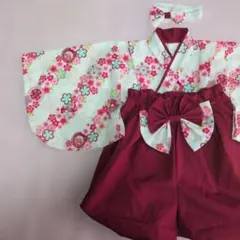 ハンドメイドのベビー袴❗️桜斜め柄。ヘアリボン付初節句に最適。お食い初月齢フォト