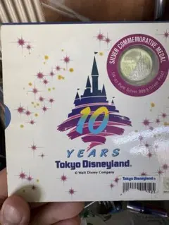 新品未開封　東京ディズニーランド 10周年記念 純銀メダル 1/4ozのサムネイル
