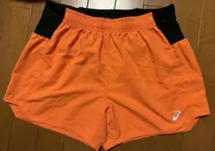 asicsランニングショートパンツ　ポケット付オレンジ色　レディースMサイズ