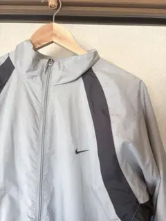 NIKE STORM-FIT ナイロンジャケット ベージュ×ボルドー - メルカリ