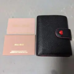 miu miu ミュウミュウ マドラスフォーエバー 二つ折り財布 黒×赤のサムネイル