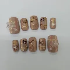 現品　モカカラーにチェックのアートとシールのネイルチップ