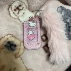 ハローキティ　スライドガラケー　キーホルダー　ヒョウ柄　ピンク しっぽ付き