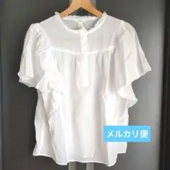 H&M フリル付きホワイト半袖ブラウス EUR 34のサムネイル