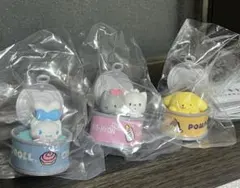 サンリオ　カンキャラ　ニャニィニュニェニョン　キティ　　ポムプリン　ガチャガチャ