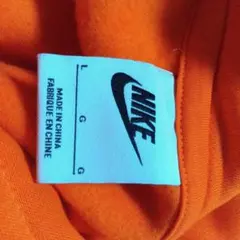 NIKE オレンジ パーカー L