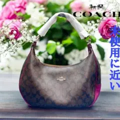 コーチシグネチャー ホーボーハンドバッグ ショルダーバッグダークブラウンパープル