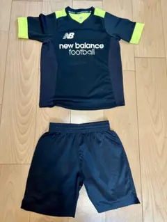 new balance サッカーウェアセット 130サイズ 黒/蛍光イエロー