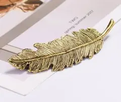 ★フェザーバレッタ　ヘアアクセサリー　髪留め　髪飾り　羽根　羽レディースゴールド