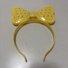 イエロー 光るリボン型カチューシャ