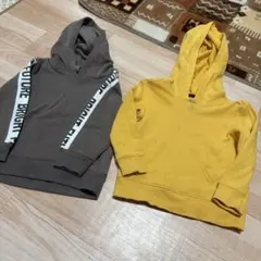 グレーとイエローのフード付きトレーナー