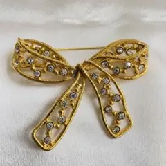 美品✨NINA RICCI ニナリッチ ブローチ リボン ラインストーン - メルカリ