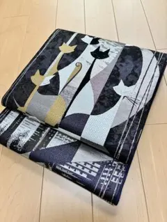 素敵な装い！西陣お洒落袋帯 綿芯仕立付 黒猫白猫 薄グレー - メルカリ