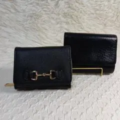 ブラック革と合成皮革折り財布2点