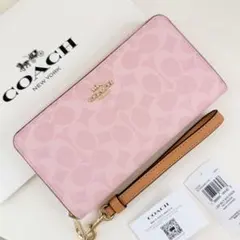 COACH コーチ　ストラップ付き　長財布　シグネチャー　パウダーピンク COACH コーチ ストラップ付き 長財布 シグネチャー パウダーピンク