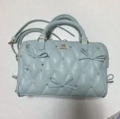 NICE CLAUP リボンビジュー付きキルティングボストンバッグ サックス