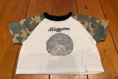 【新品タグ付き】モンチッチ×KOGYARU バースデイ　迷彩Tシャツ110cmのサムネイル