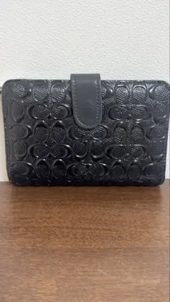 COACH二つ折り財布エンボス加工 ブラックレザー