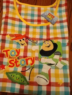 ディズニートイ・ストーリー保育士、介護士エプロン新品未使用タグ付