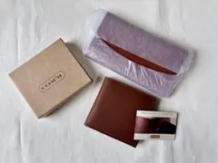Old coach set of 2 leather wallets