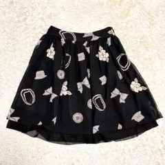 M'S GRACY 膝丈スカート 総柄 リボン カメリア パール 36のサムネイル
