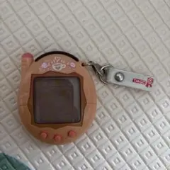 たまごっち本体 赤たまのサムネイル