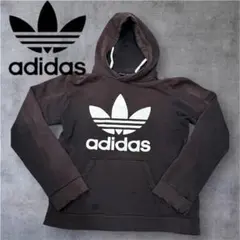 トレフォイルロゴadidas パーカー　フーディーアディダス　フェード　古着　黒