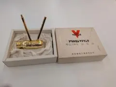 アリナミンVドリンク 発売3周年記念品 ゴールド置物　ペン立て
