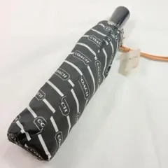 新品　COACH コーチ　文字ロゴ　晴雨兼用ワンタッチジャンプ折りたたみ傘のサムネイル