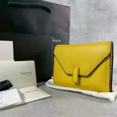 【付属品完備】ヴァレクストラ イジィデ 三つ折り財布 イエローのサムネイル
