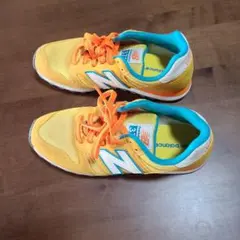 new balance 373 スニーカー イエロー/オレンジ