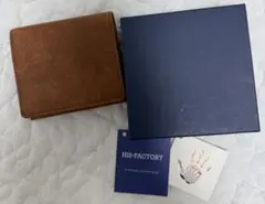 新品未使用 HIS-FACTORY 二つ折り財布 ダークブラウン - メルカリ