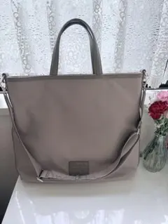 新品未使用】TUMI 折りたたみバッグ ライトグレー - メルカリ