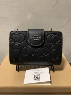 ✨️新品未使用✨️COACH エンボス加工 ブラック 二つ折り財布