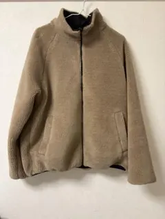 ベージュ フリースジャケット ハイネック