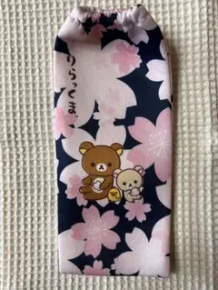 ①リラックマ 桜柄ペットボトルカバー。