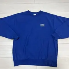 RODEO CROWNS WIDE BOWL 青トレーナー