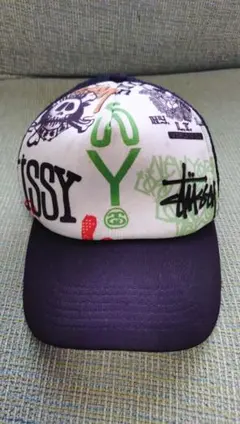 Stussy ステューシー トラッカーキャップ 総柄【調整ベルト破損箇所あり】のサムネイル