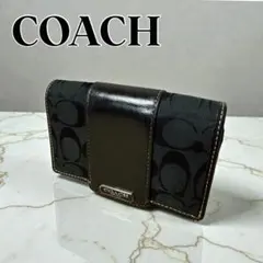 COACH コーチ折財布　シグネチャー黒　ロゴ入り　内側ピンク