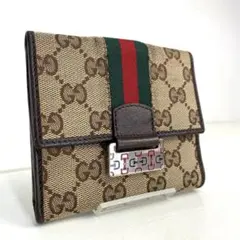 【美品】GUCCI 二つ折り財布 シェリーライン キャンバス レザー プレート