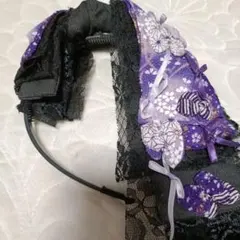 紫と黒の花柄ヘアバンドのサムネイル