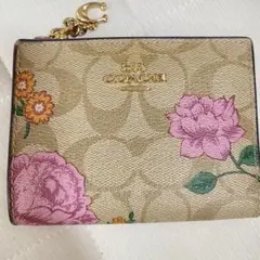 COACH シグネチャー 花柄 二つ折り財布のサムネイル