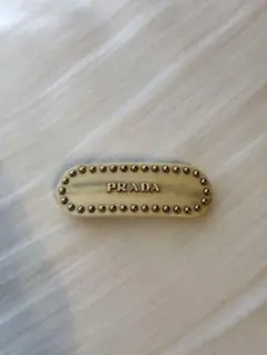 PRADA ヘアクリップ アイボリー
