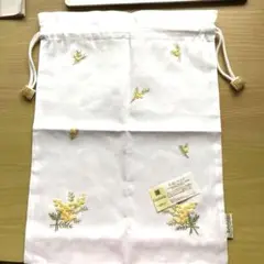 新品タグ付き　クチュール　花柄刺繍の巾着袋 100%コットン　L