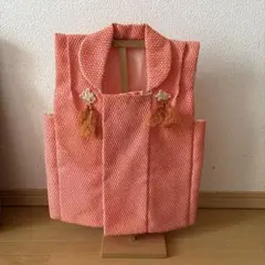 わらべ被布　初節句　ひなまつ　被布着　総絞り風　朱色　オレンジ　花飾り付き
