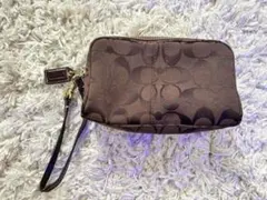 美品コーチCOACH　シグネチャーキャンバスレザーストラップミニポーチ　小物入れ