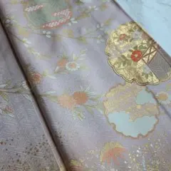 地紋と金彩が美しい　雪輪と草花模様の訪問着